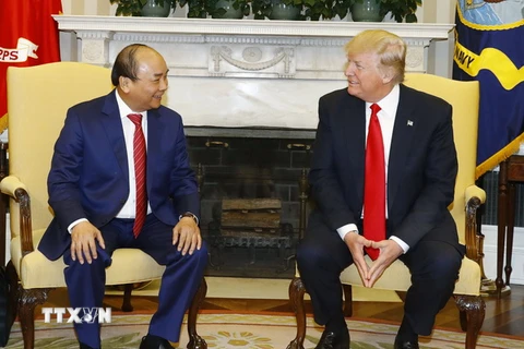 Thủ tướng Nguyễn Xuân Phúc và Tổng thống Hợp chúng quốc Hoa Kỳ Donald Trump. (Ảnh: Thống Nhất/TTXVN)