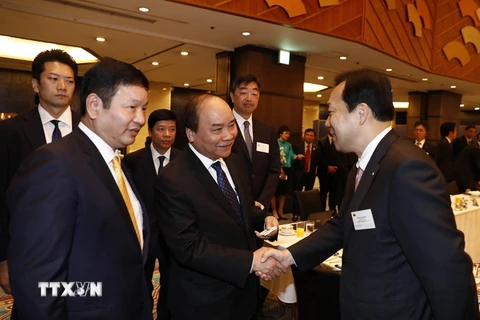 Thủ tướng Nguyễn Xuân Phúc trong buổi làm việc với các Doanh nghiệp Công nghệ thông tin Nhật Bản. (Ảnh: Thống Nhất/TTXVN)