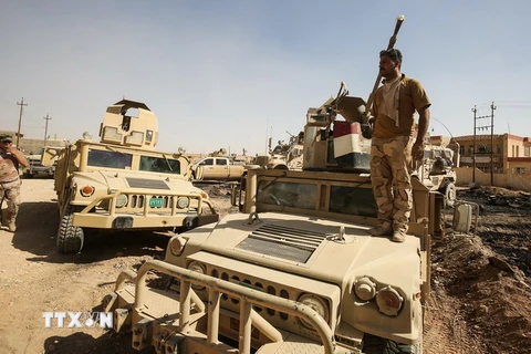 Các lực lượng Iraq làm nhiệm vụ trong chiến dịch chống IS tại Tal Afar ngày 25/8. (Nguồn: AFP/TTXVN)