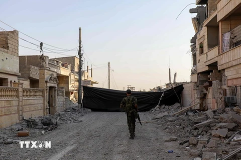 Cảnh đổ nát sau các cuộc giao tranh tại Raqqa, Syria ngày 5/9. (Nguồn: AFP/TTXVN)