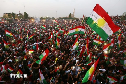 Cộng đồng người Kurd ở Iraq tuần hành kêu gọi người dân tham gia cuộc trưng cầu dân ý về độc lập tại thủ phủ Arbil ngày 16/9. (Nguồn: AFP/TTXVN)