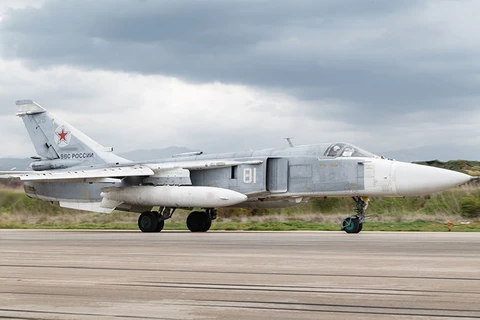 Máy bay tấn công Su-24 tại căn cứ không quân Khmeimim, Syria. (Nguồn: Sputnik)