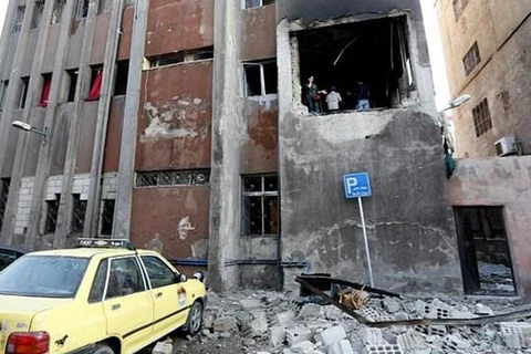 Hiện trường một vụ đánh bom ở Damascus. (Nguồn: AFP)