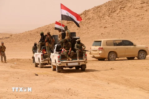Các lực lượng Iraq tiến vào khu vực Anna, tỉnh Anbar trong chiến dịch chống IS ngày 20/9. (Nguồn: AFP/TTXVN)