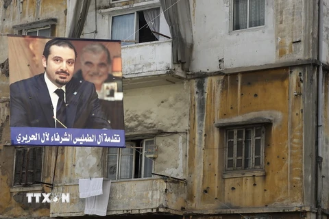 Ảnh Thủ tướng Liban Saad Hariri trên một đường phố ở thủ đô Beirut ngày 17/11. (Nguồn: AFP/TTXVN) 