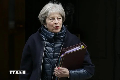 Thủ tướng Anh Theresa May tham dự cuộc họp báo tại London ngày 10/1. (Nguồn: THX/TTXVN)