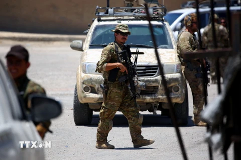 Binh sỹ Mỹ gác tại thị trấn Tabqa, Syria ngày 29/6/2017. (Nguồn: AFP/TTXVN)