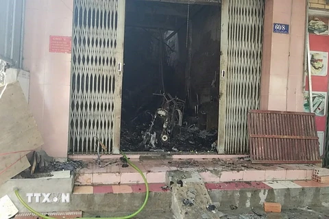 Hỏa hoạn đã thiêu rụi nhiều tài sản ở tầng 1 của căn nhà. (Nguồn: TTXVN)
