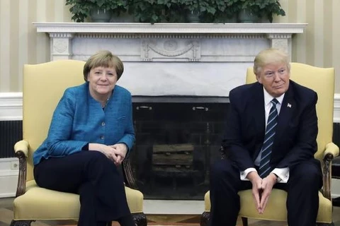 Thủ tướng Đức Angela Merkel và Tổng thống Mỹ Donald Trump. (Nguồn: AP)
