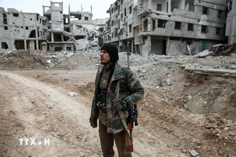 Phiến quân Syria tại Đông Ghouta ngày 15/2. (Nguồn: AFP/TTXVN)