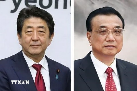 Thủ tướng Trung Quốc Lý Khắc Cường (phải) và Thủ tướng Nhật Bản Shinzo Abe. (Nguồn: Kyodo/TTXVN)