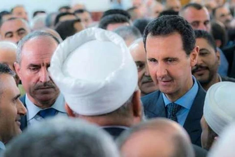 Đây được xem là lần xuất hiện hiếm hoi bên ngoài thủ đô Damascus của nhà lãnh đạo Syria. (Nguồn: gulf-times.com)