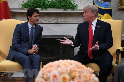 Thủ tướng Canada Justin Trudeau và Tổng thống Mỹ Donald Trump. (Nguồn: AFP/TTXVN)