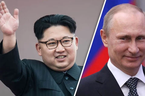 Tổng thống Nga Vladimir Putin (phải) và nhà lãnh đạo Triều Tiên Kim Jong-un. (Nguồn: Getty)