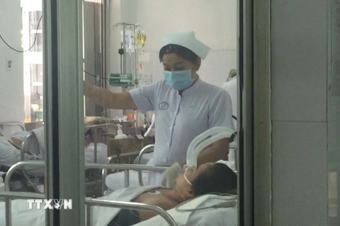 Bệnh nhân nhiễm cúm A/H1N1 nguy kịch đang được cách ly điều trị tại Bệnh viện Chợ Rẫy. (Ảnh: Đinh Hằng/TTXVN)