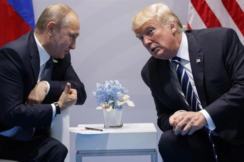 Tổng thống Mỹ Donald Trump (phải) và người đồng cấp Nga Vladimir Putin. (Nguồn: AP) 