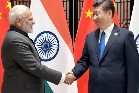 Thủ tướng Ấn Độ Narendra Modi (trái) và Chủ tịch nước Trung Quốc Tập Cận Bình. (Nguồn: Hindustan Times)