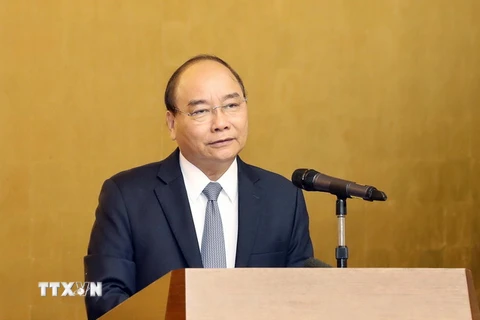 Thủ tướng Nguyễn Xuân Phúc phát biểu tại buổi gặp mặt. (Ảnh: Thống Nhất/TTXVN)