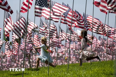 Hình ảnh nước Mỹ tưởng niệm các nạn nhân loạt vụ khủng bố 11/9