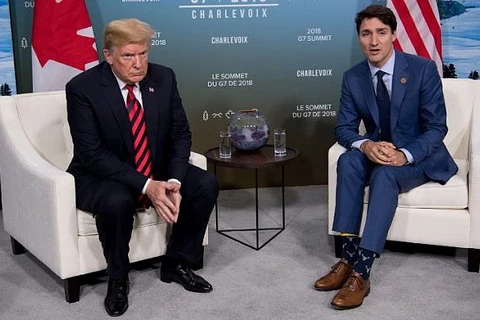 Tổng thống Mỹ Donald Trump (trái) và Thủ tướng Canada Justin Trudeau. (Nguồn: AFP)