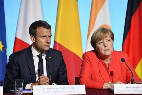 Tổng thống Pháp Emmanuel Macron và Thủ tướng Đức Angela Merkel. (Nguồn: time.com) 