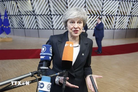 Thủ tướng Anh Theresa May phát biểu với báo giới tại Hội nghị thượng đỉnh EU ở Brussels, Bỉ ngày 13/12/2018. (Nguồn: THX/TTXVN)