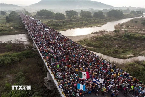 Người di cư Honduras tại khu vực Arriaga, Mexico. (Nguồn: AFP/TTXVN) 