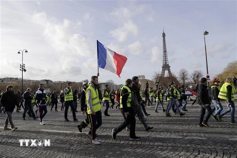 Người biểu tình Áo vàng tập trung tại thủ đô Paris, Pháp, ngày 9/2/2019. (Nguồn: AFP/TTXVN) 