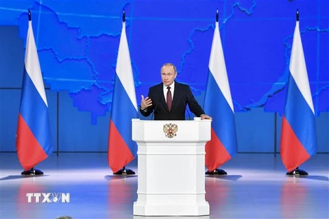 Tổng thống Vladimir Putin đọc Thông điệp liên bang thường niên trước Hội đồng Liên bang Nga ở Moskva ngày 20/2. (Nguồn: AFP/TTXVN) 