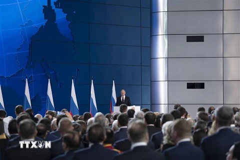Tổng thống Nga Putin đọc Thông điệp liên bang trước hai viện Quốc hội. (Ảnh: Tâm Hằng/TTXVN) 