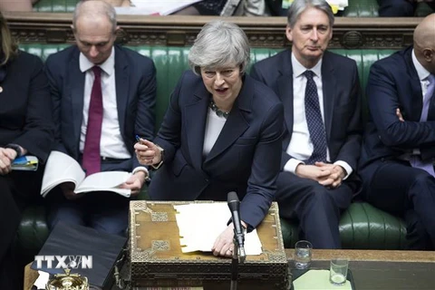 Thủ tướng Anh Theresa May (phía trước) tại phiên họp của Hạ viện ở London ngày 13/2/2019. (Nguồn: THX/TTXVN) 