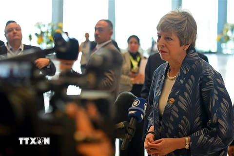 Thủ tướng Anh Theresa May phát biểu với báo giới tại Sharm el-Sheikh, Ai Cập, ngày 24/2/2019. (Nguồn: AFP/TTXVN) 