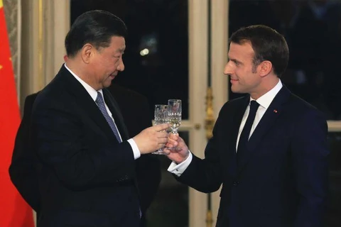 Chủ tịch Trung Quốc Tập Cận Bình và Tổng thống Pháp Emmanuel Macron. (Nguồn: AP) 