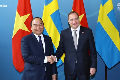 Thủ tướng Nguyễn Xuân Phúc và Thủ tướng Thụy Điển Stefan Löfven. (Ảnh: Thống Nhất/TTXVN) 
