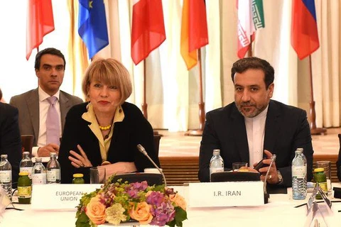 Thứ trưởng Ngoại giao Iran Abbas Araghchi đã có cuộc gặp với quan chức ngoại giao Liên minh châu Âu (EU) Helga Schmid. (Nguồn: AFP) 