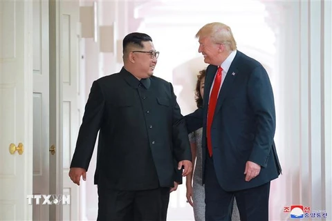 Tổng thống Mỹ Donald Trump (phải) và nhà lãnh đạo Triều Tiên Kim Jong-un (trái). (Nguồn: AFP/TTXVN) 