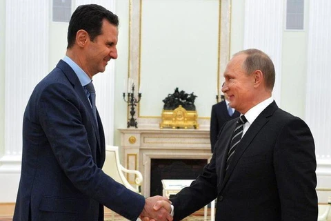 Tổng thống Syria Bashar al-Assad và người đồng cấp Nga Vladimir Putin. (Nguồn: AFP/Getty Images) 