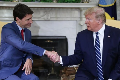 Tổng thống Mỹ Donald Trump (phải) và Thủ tướng Canada Justin Trudeau. (Nguồn: Reuters) 