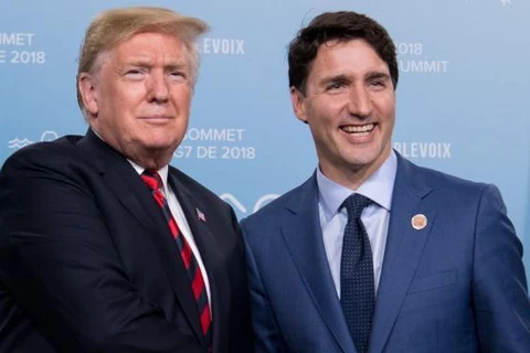 Tổng thống Mỹ Donald Trump và Thủ tướng Canada Justin Trudeau. (Nguồn: AFP) 