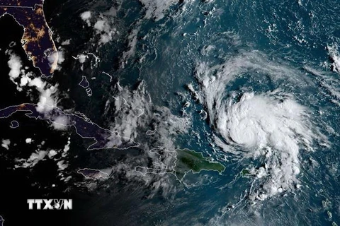 Hình ảnh ghi từ vệ tinh NOAA/RAMMB cho thấy bão Dorian quét qua vùng lãnh thổ Pueto Rico thuộc Mỹ trên vùng biển Caribe ngày 29/8/2019. (Nguồn: AFP/TTXVN) 