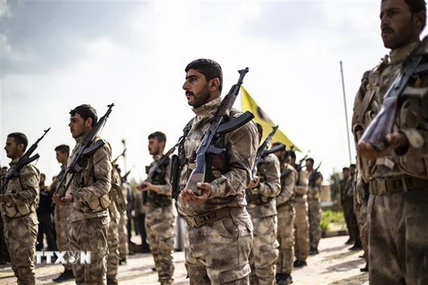 Thành viên của Các lực lượng Dân chủ Syria (SDF) tại Deir Ezzor, Syria, ngày 10/4/2019. (Nguồn: AFP/TTXVN) 