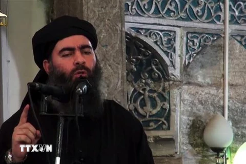 Thủ lĩnh tổ chức Nhà nước Hồi giáo (IS) tự xưng Abu Bakr al-Baghdadi phát biểu trước một nhà thờ Hồi giáo ở thành phố Mosul, miền Bắc Iraq tháng 7/2014. (Nguồn: AFP/TTXVN) 