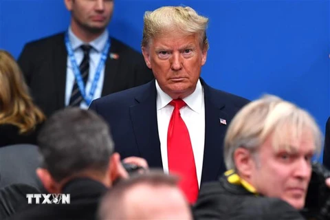 Tổng thống Mỹ Donald Trump (giữa). (Nguồn: AFP/TTXVN) 