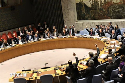 Các nước thành viên Hội đồng Bảo an Liên hợp quốc bỏ phiếu thông qua nghị quyết. (Ảnh: Khắc Hiếu/TTXVN) 