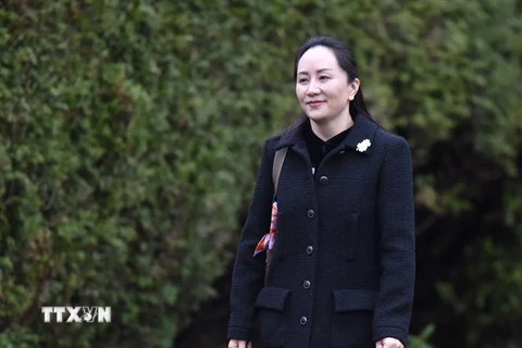CFO Tập đoàn Huawei của Trung Quốc, Mạnh Vãn Châu, tới Tòa án Tối cao ở British Columbia, Canada để bắt đầu phiên tòa xem xét việc dẫn độ bà về Mỹ, ngày 20/1/2020. (Nguồn: AFP/TTXVN) 