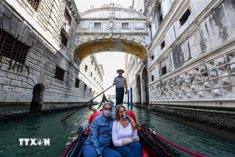 Đi thuyền tại Venice, Italy. (Nguồn: AFP/TTXVN) 