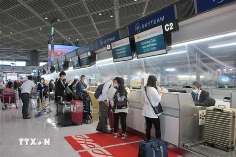 ​Quầy của Vietnam Airlines ở sân bay Narita. (Ảnh: Đào Thanh Tùng/TTXVN) 