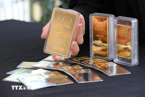 Vàng miếng tại sàn giao dịch vàng ở Seoul, Hàn Quốc. (Nguồn: Yonhap/TTXVN) 