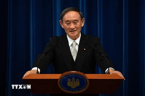 Tân Thủ tướng Nhật Bản Yoshihide Suga phát biểu tại cuộc họp báo ở Tokyo ngày 16/9/2020. (Nguồn: AFP/TTXVN) 