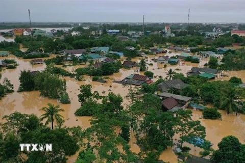 Lũ lớn trên sông Hiếu gây ngập diện rộng tại khu vực xã Thanh An, huyện Cam Lộ, tỉnh Quảng Trị. (Ảnh: Hồ Cầu/TTXVN) 
